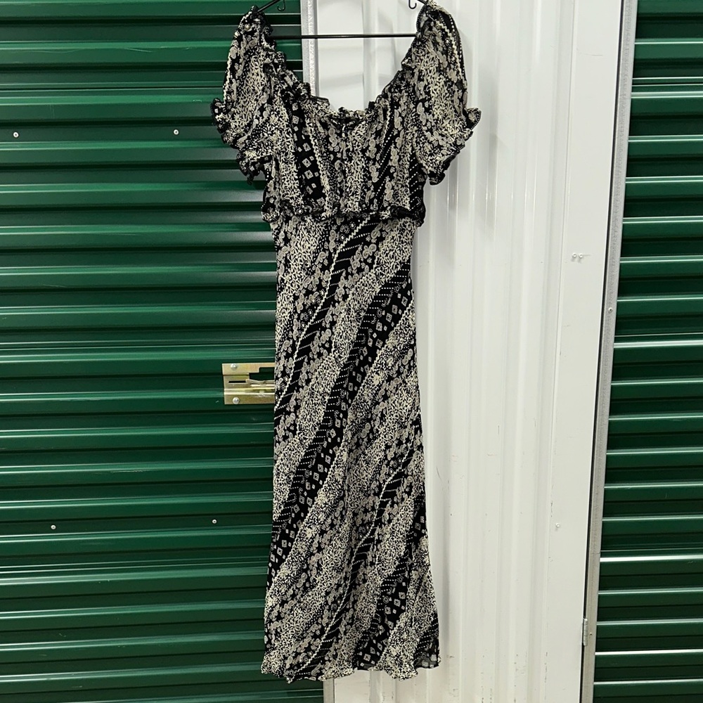 Elegant Black and Cream Patterned Maxi Dress